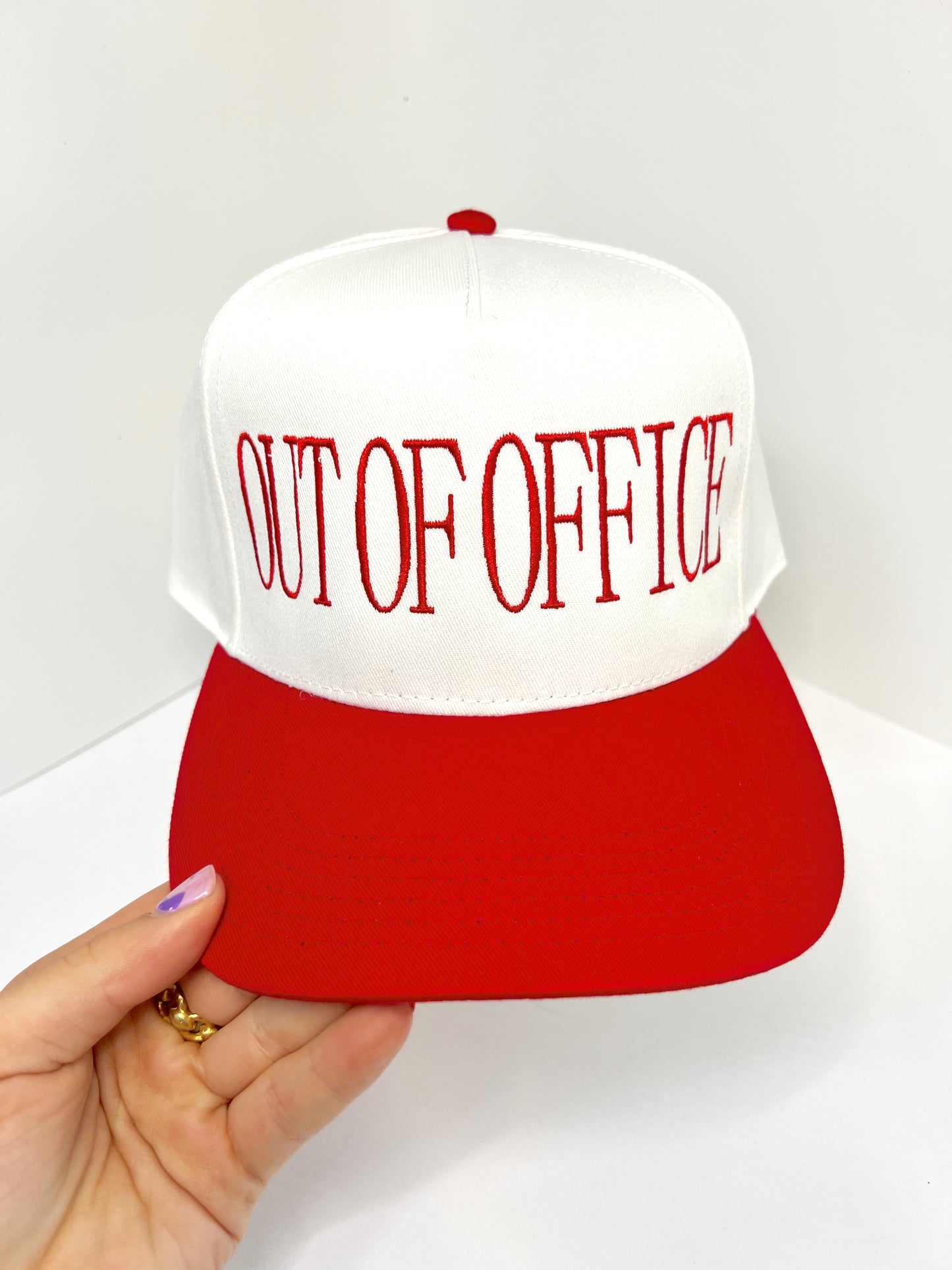 ‘OUT OF OFFICE’ CANVAS TRUCKER HAT