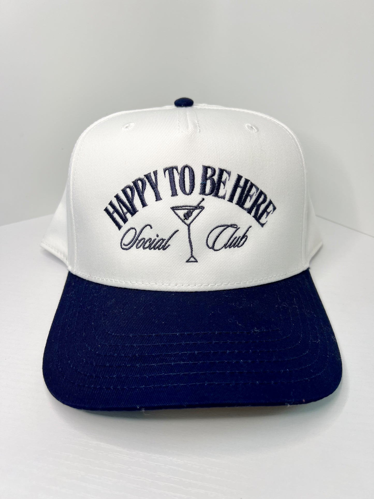 ‘HAPPY TO BE HERE SOCIAL CLUB’ CANVAS TRUCKER HAT—Navy Blue