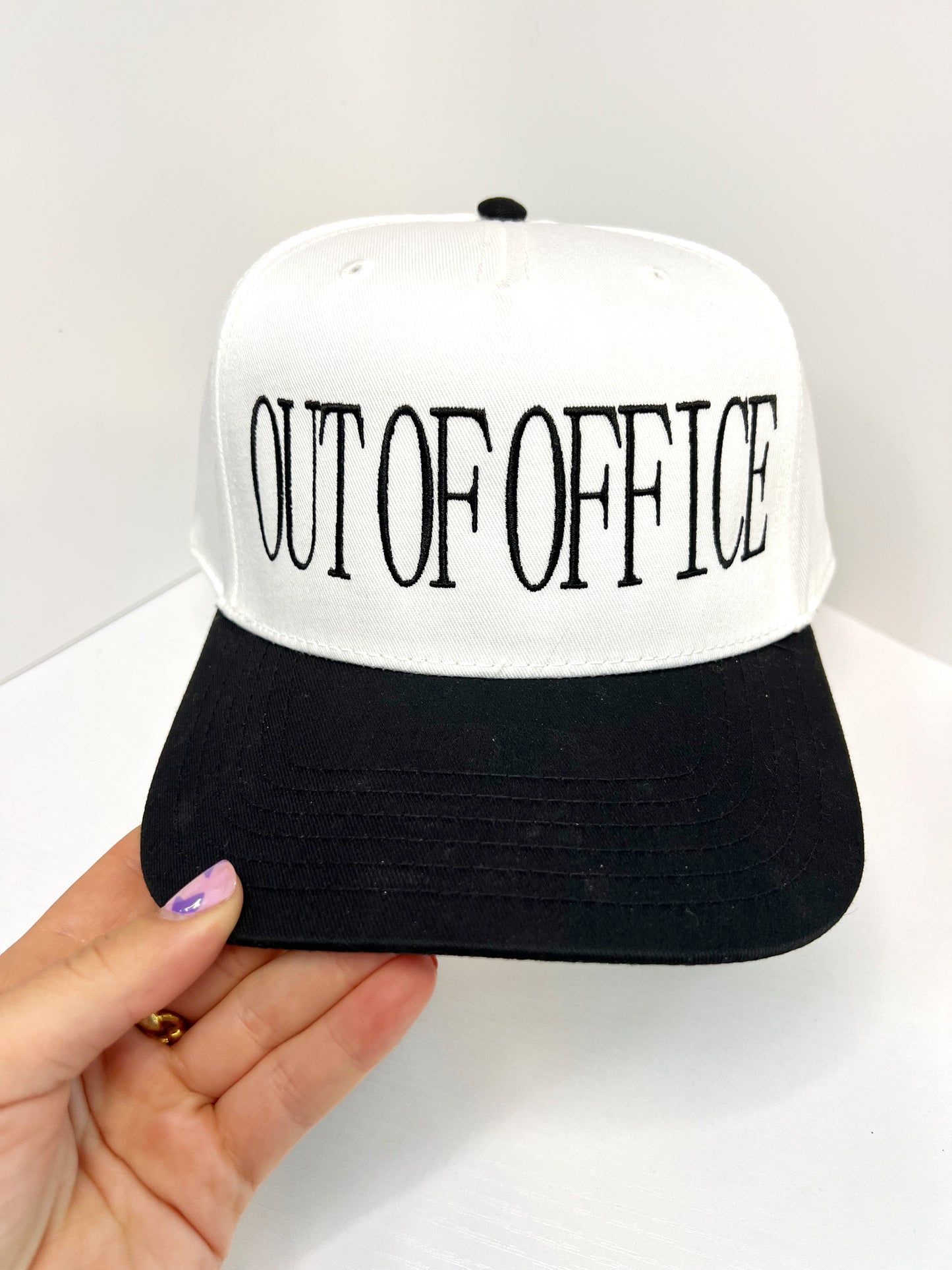 ‘OUT OF OFFICE’ CANVAS TRUCKER HAT